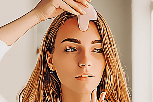woman using gua sha