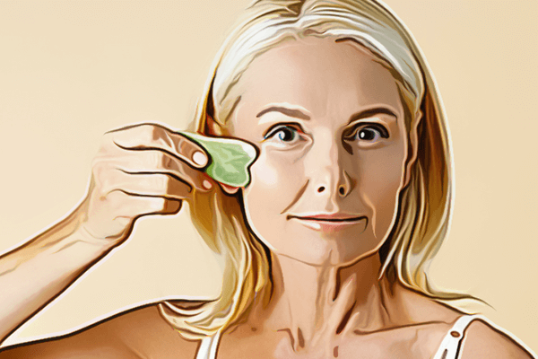 woman using gua sha