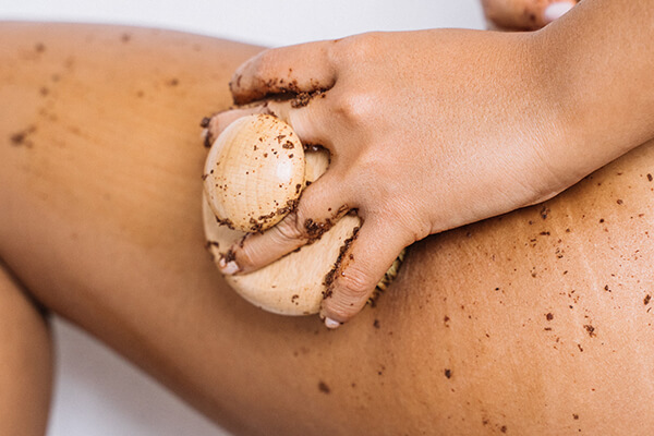 woman exfoliating