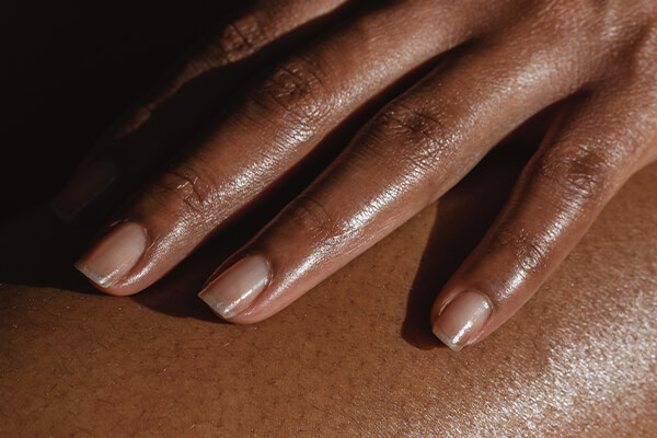 woman applying oil
